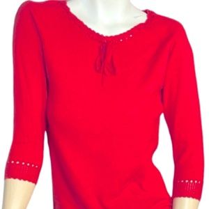 I.e. red sweater top. Size small.